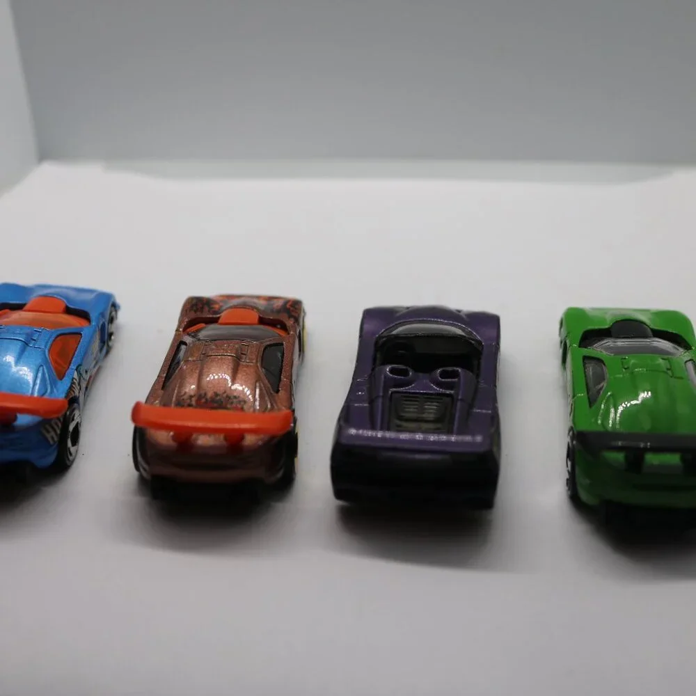 Hot Wheels lot of 4  three Caloways and one Ferrari